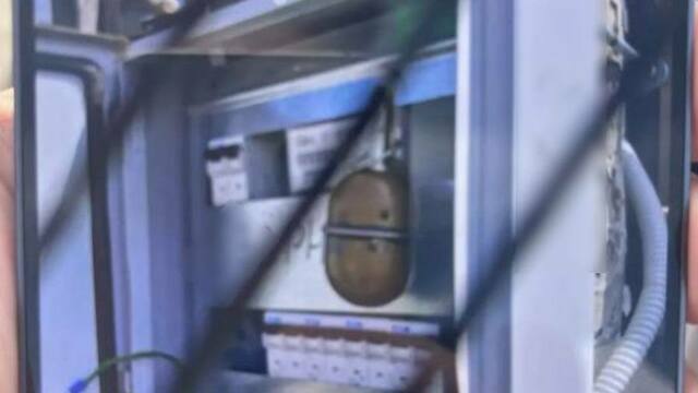 В СНТ «Колосок» хозяин участка попытался отпугнуть энергетиков муляжом гранаты (фото, видео)